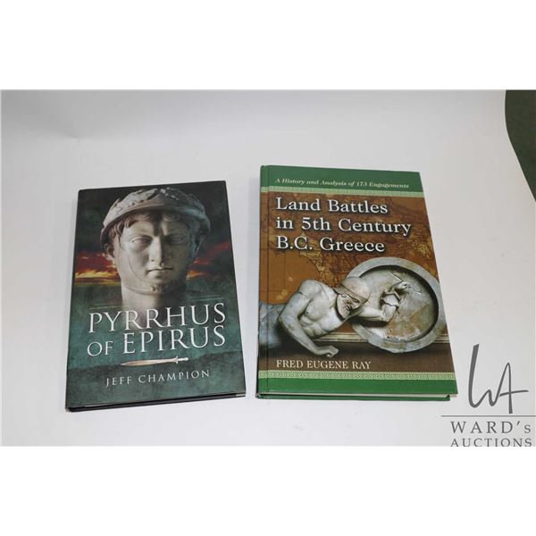 Two hardcover books, " Pyrrhus of Epirus" by Jeff Champion and "Land Battles in the 5th Century B.C.