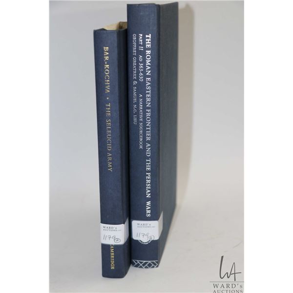 Two hardcover books including "Seleucid Army: Organization and Tactics" by Belazel Bar-Kova and "Rom