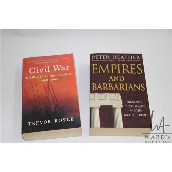 Two softcover books including "Empires and Barbarians: Migration Development and Birth of Europe" by