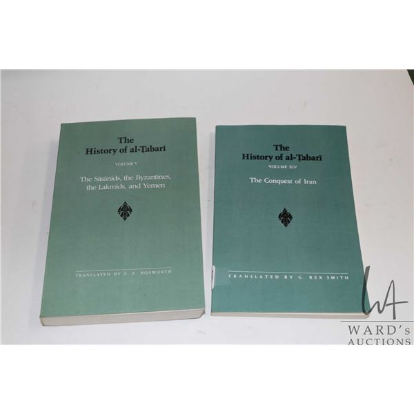 Two softcover books including "The History of al-Tabari: Vol. V The Sasanids, the Byzantines, the La