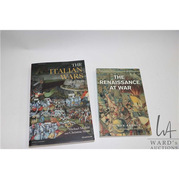 Two softcover books including "Cassell History of Warfare: The Renaissance at War" by Thomas Arnold 