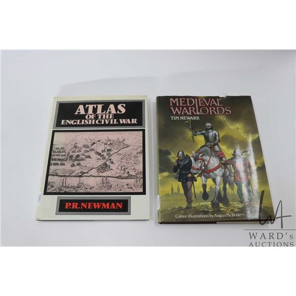 Two hardcover books including "Medieval Warlords" by Tim Newark and "Atlas of the English Civil War"