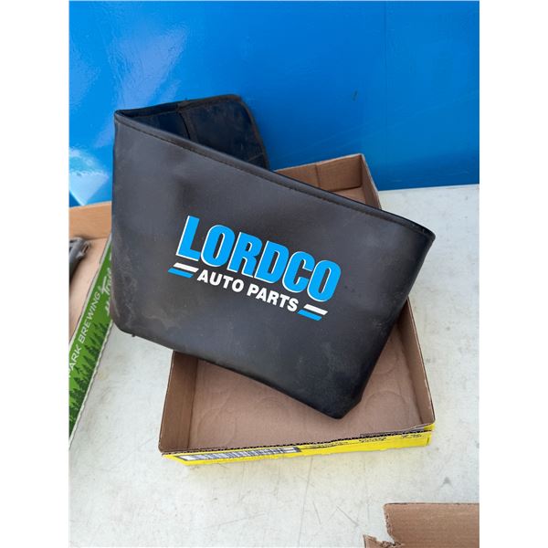 Automotive tool belt goes on fender