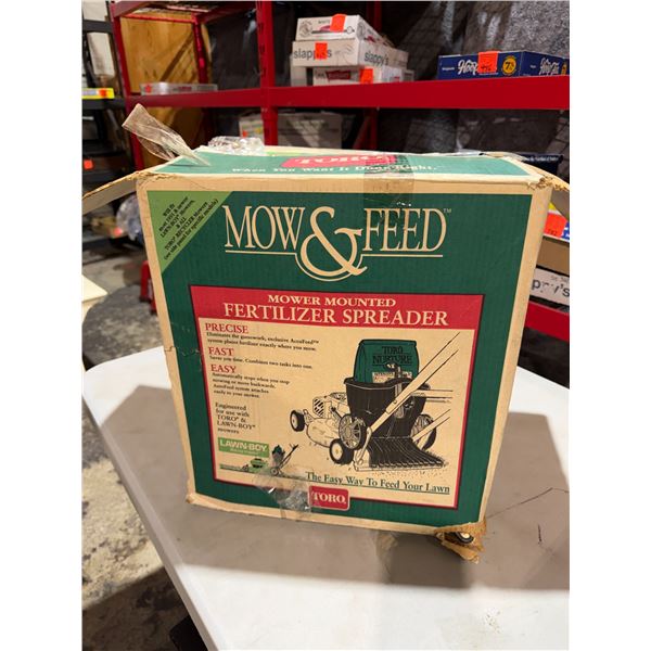 Mower mounted fertilizer spreader Toro