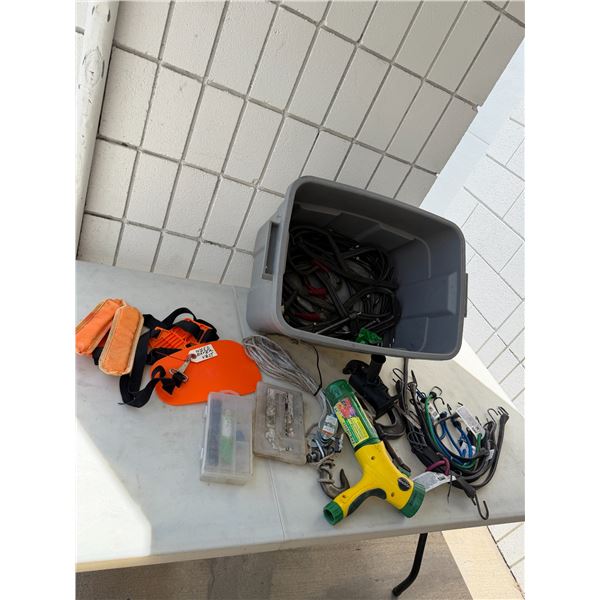 Bungee cord, weedeater, vest, and other items