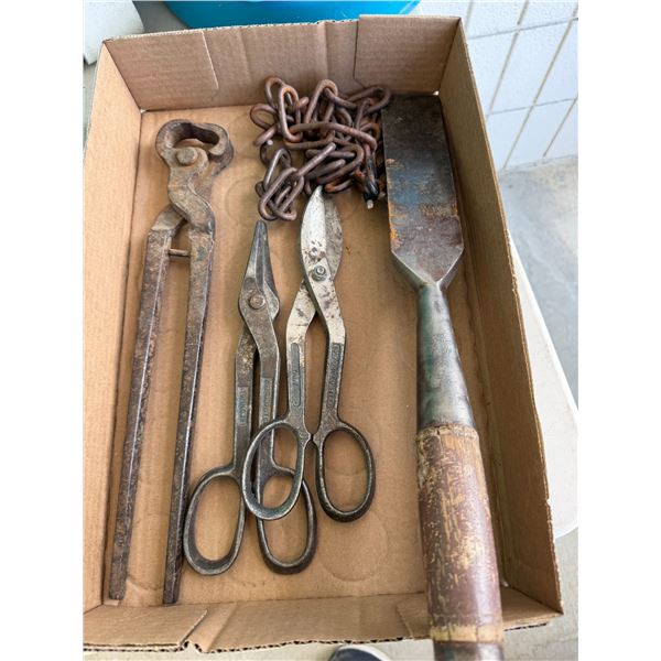 Assorted tools and chain