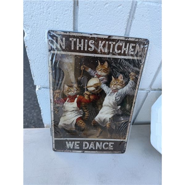 In this kitchen, we dance tin sign