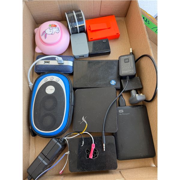 Assorted electronics, speaker, speakers and passports, etc.