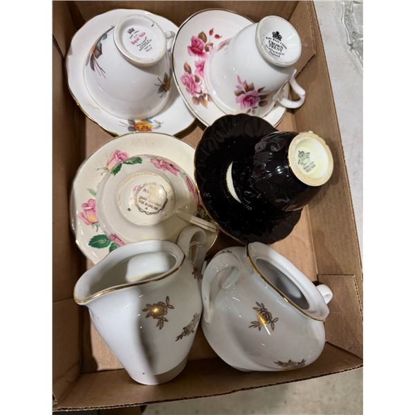 Teacup, saucers, and other items