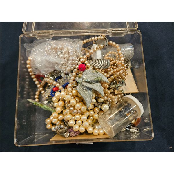 Lot of assorted jewlery & container