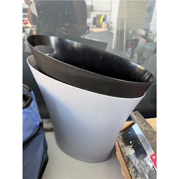 Two garbage cans