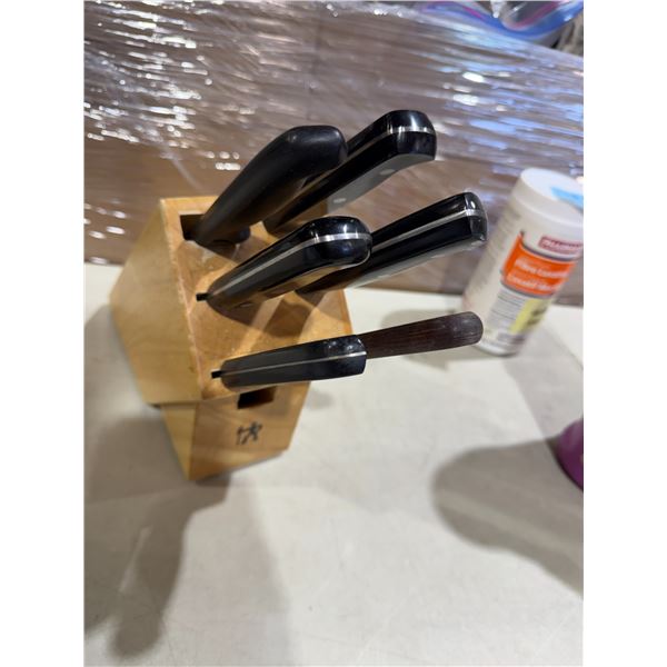 J. A. Hinkel Knife block with assorted knives.