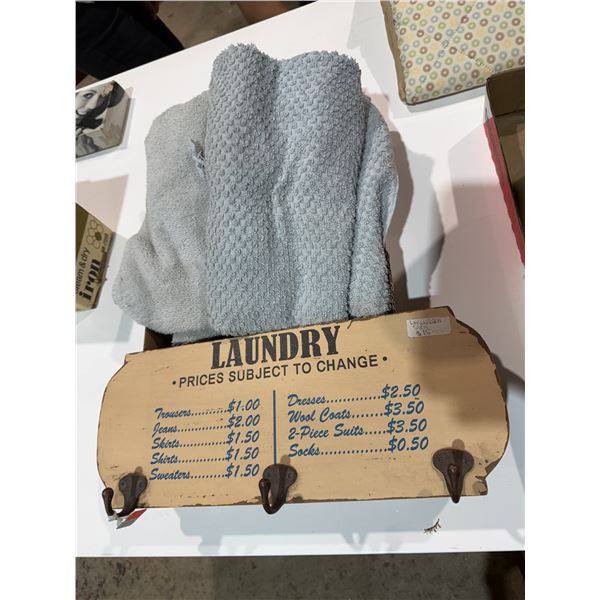 Towels and laundry sign