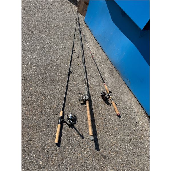 Three fishing rods with reels