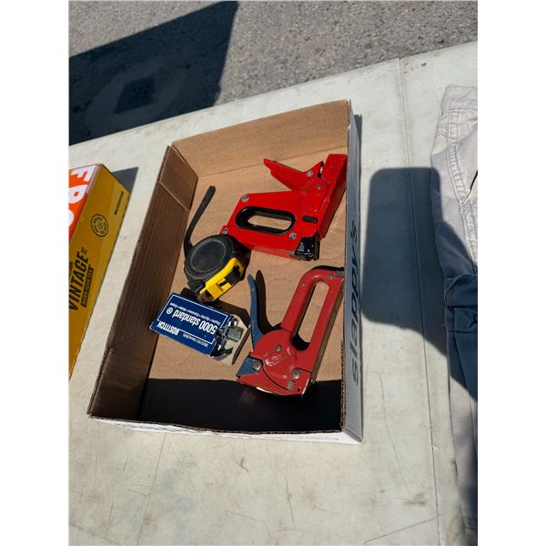 Stapler, staples, and measuring tape
