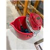 Image 1 : Mop, bucket, and auger