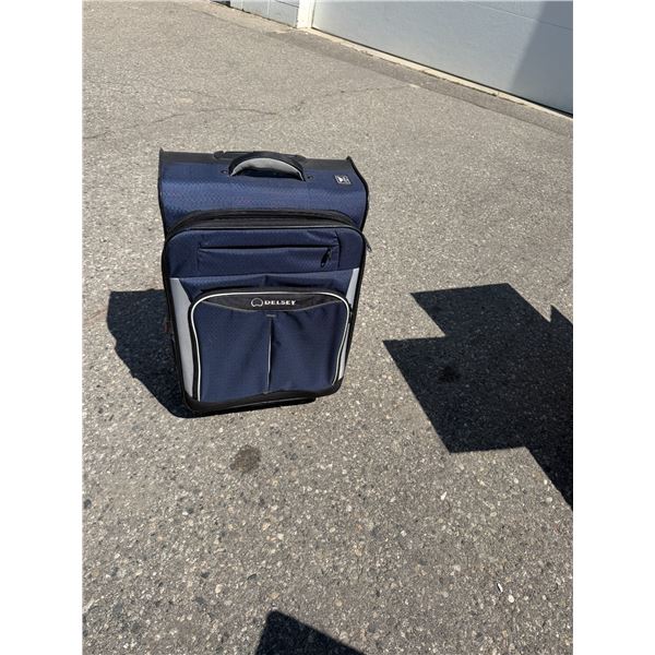 DELSEY4 wheeled suitcase