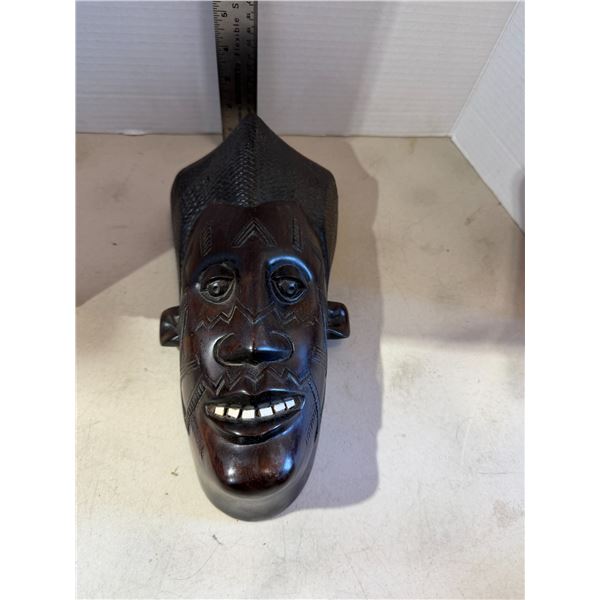 Carved face