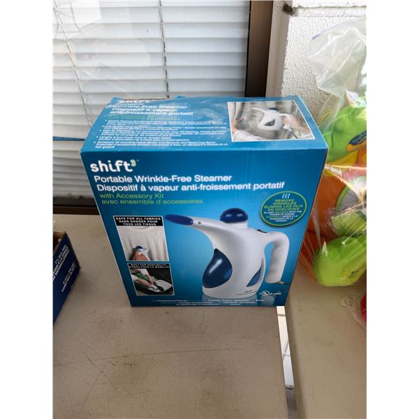 Shift portable wrinkle free steamer