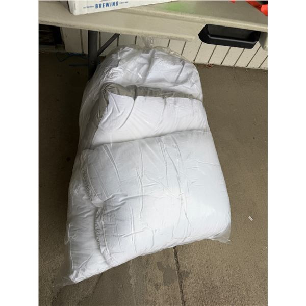 Two Calvin Klein and two other pillows