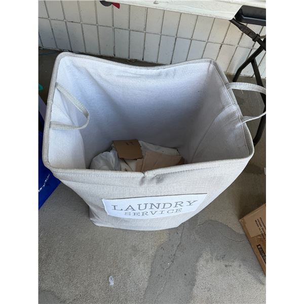 Laundry basket and assorted linens
