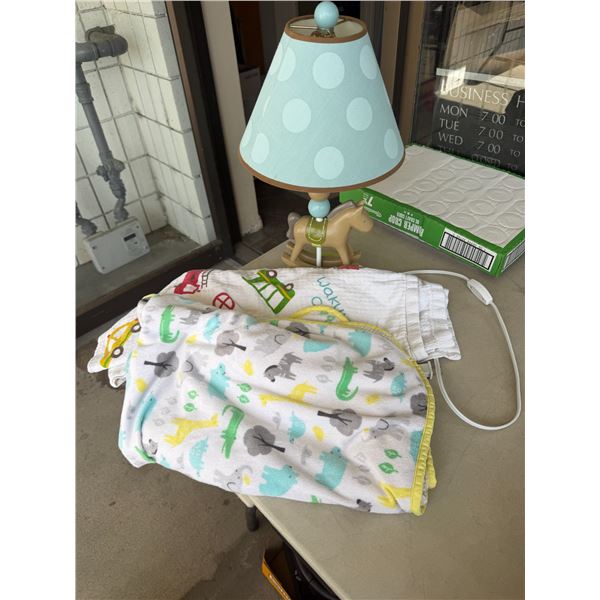 Lamp and baby blanket