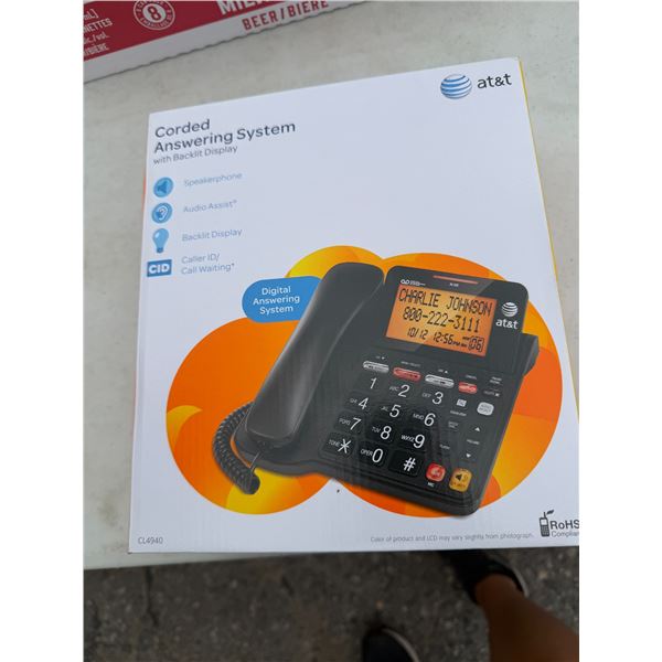 Corded answering system with back lit display