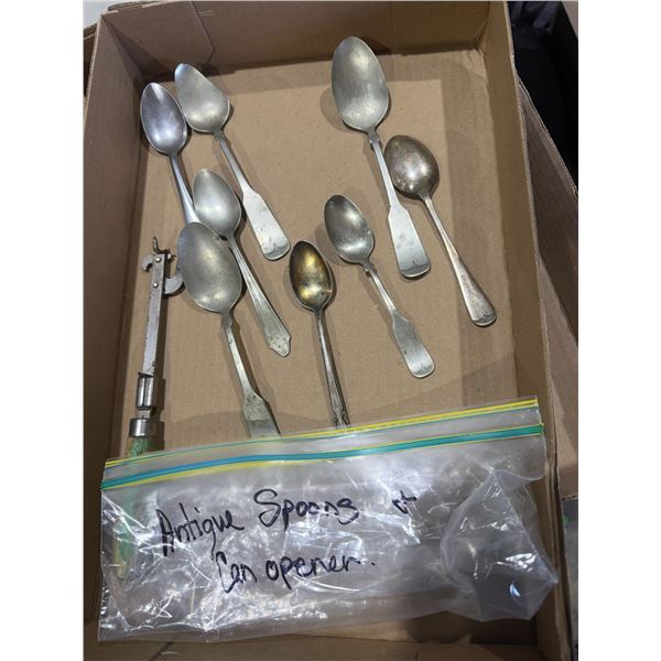 Antique spoons and can opener