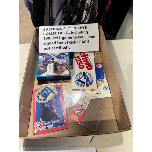Baseball and Blue Jays collectibles, including 1985 and 1991 game ticket