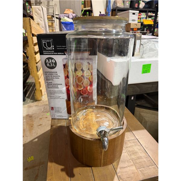 Beverage dispenser glass the wood base has a crack does not effect usage can be glued