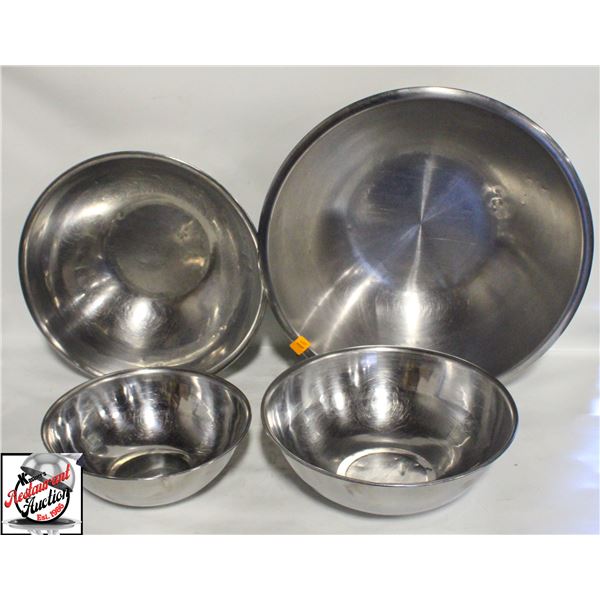 FOUR LARGE STAINLESS STEEL MIXING BOWLS