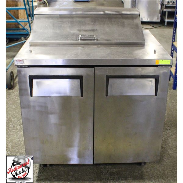 TRUE 2 DOOR REFRIGERATED PREP TABLE ON CASTERS