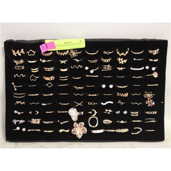 TRAY W/100 GOLDTONE RINGS
