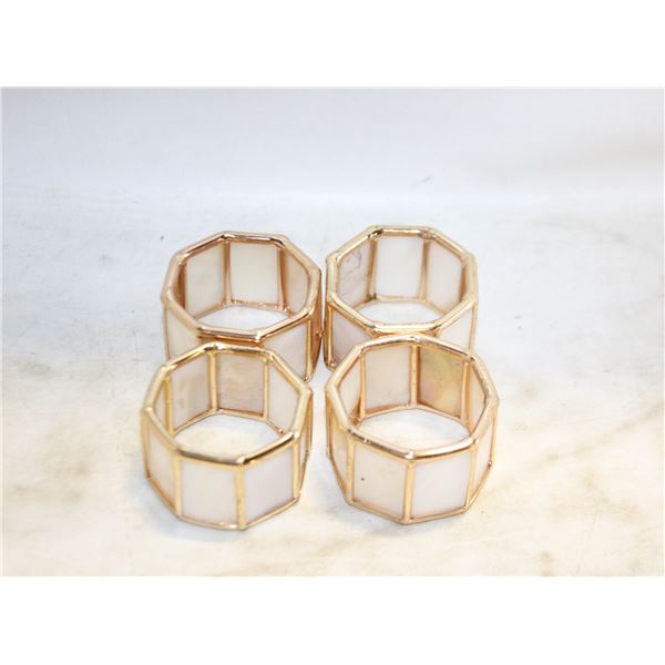 4 GOLD TONE AND MOTHER OF PEARL NAPKIN RINGS