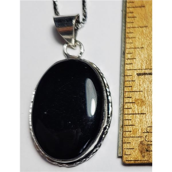 20) SILVER TONE AND NATURAL BLACK