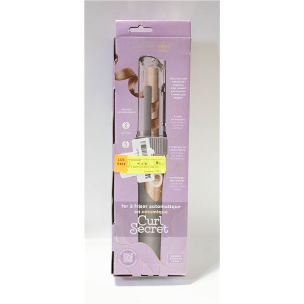 INFINITY PRO CONAIR CURLING IRON.