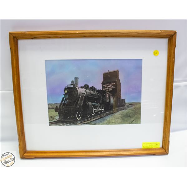 PICTURE OF LOCAMOTIVE AND SASK POOL ELEVATOR