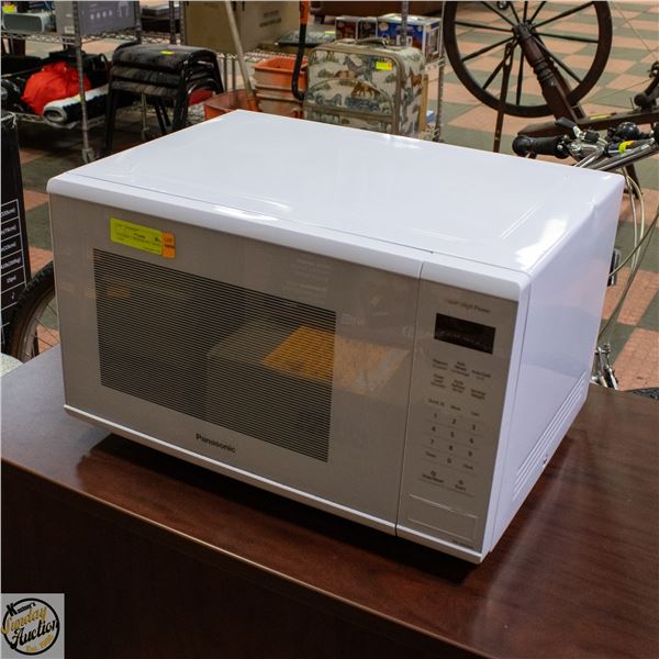 PANASONIC MICROWAVE 1100 WATT USED H-12.75" W-15"