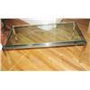 Image 1 : Chrome and glass modern coffee Table