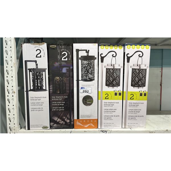 SHELF OF SOLAR SHEPHERD'S HOOK LANDSCAPE LIGHTS *WORKING CONDITION UNKNOWN/MAY BE MISSING PARTS AND
