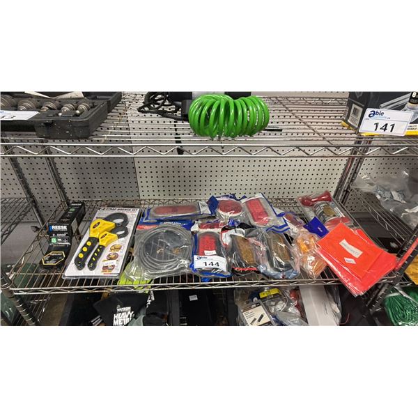 SHELF OF ASSORTED ITEMS INCLUDING; STRAP WRENCH SET, 2" DROP HITCH, AUTOMOTIVE LIGHTS & MORE
