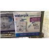 Image 2 : (3) WATERPICK WATER FLOSSER TWIN PACKS *WORKING CONDITION UNKNOWN/MAY BE MISSING PARTS & OR PIECES*