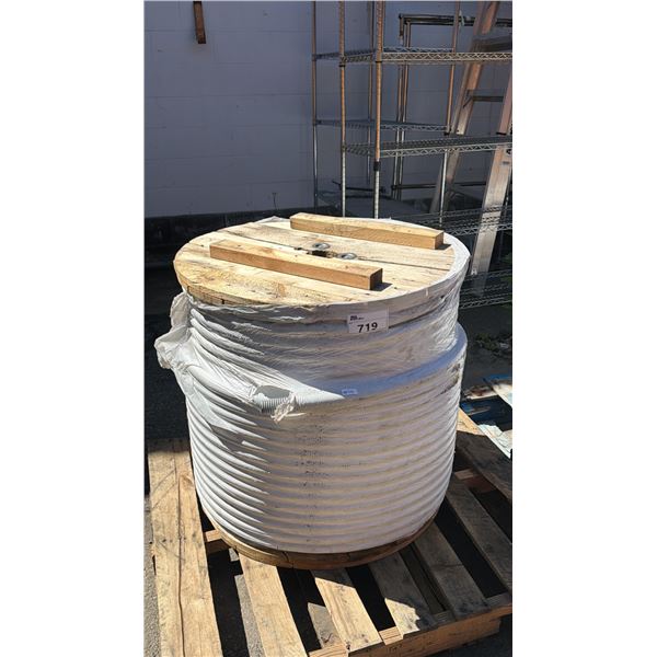 SPOOL OF WHITE PVC FLEXIBLE CONDUIT PIPE