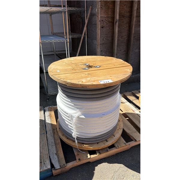 SPOOL OF WHITE PVC FLEXIBLE CONDUIT PIPE