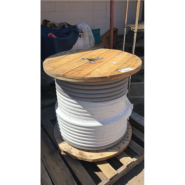 SPOOL OF WHITE PVC FLEXIBLE CONDUIT PIPE