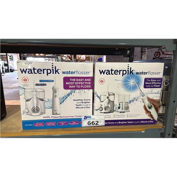 (2) WATERPICK WATER FLOSSER TWIN PACKS  *WORKING CONDITION UNKNOWN/MAY BE MISSING PARTS & OR PIECES*