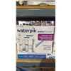 Image 2 : (2) WATERPICK WATER FLOSSER TWIN PACKS  *WORKING CONDITION UNKNOWN/MAY BE MISSING PARTS & OR PIECES*