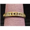 Image 1 : 14KT GOLD CHANNEL SET GEMSTONE RING: SIZE 7