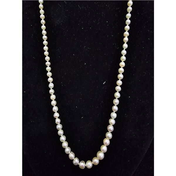 INDIVIDUALLY KNOTTED CREAM FRESHWATER PEARL NECKLACE: