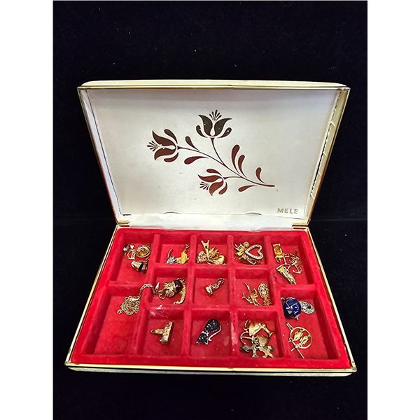 JEWELRY BOX OF ASSORTED CHARMS - MANY ARE GOLD: INCLUDES A 14KT GOLD ITALIAN CHAIN BRACELET